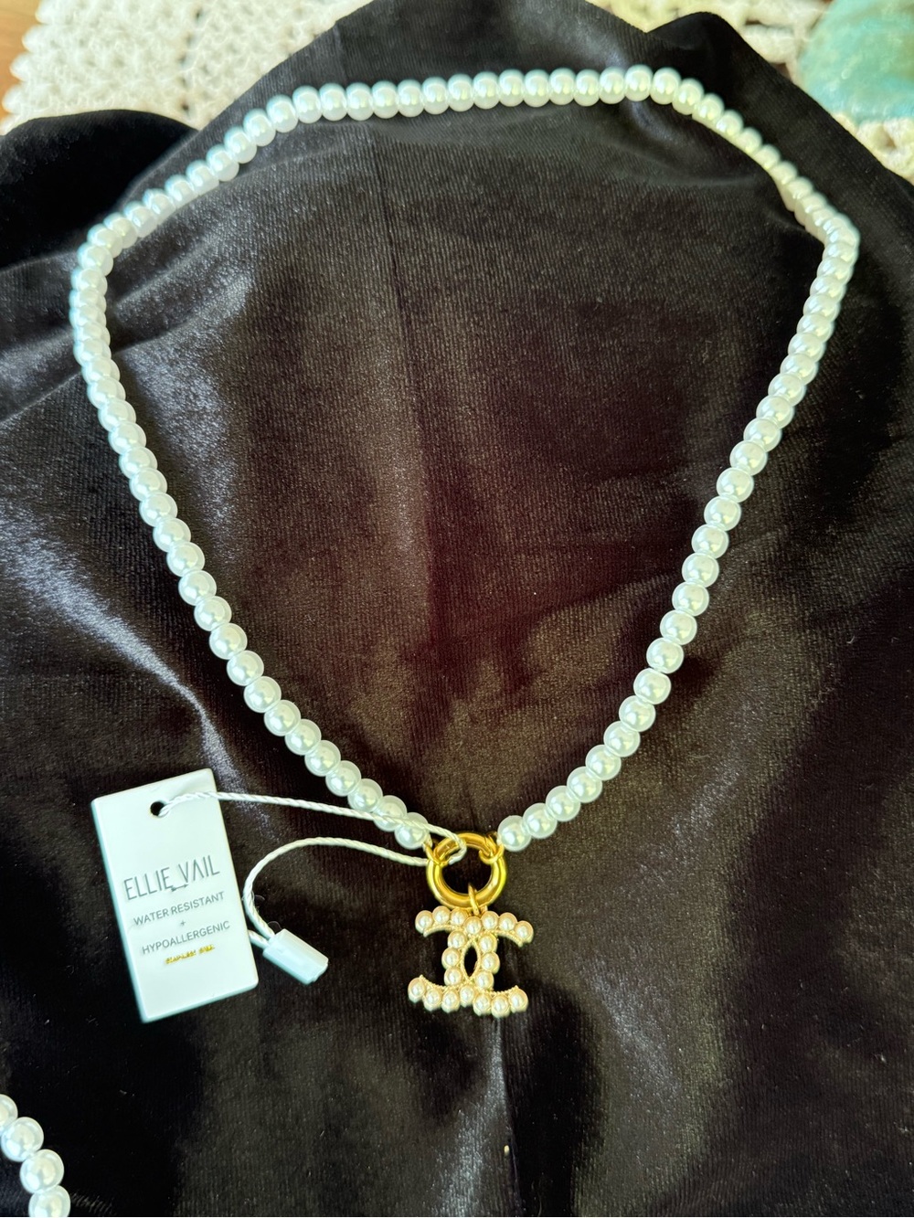 White Faux Pearl Necklace with Gold Logo Charm